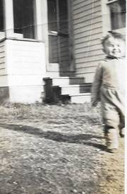 A black and white photo of a person

Description automatically generated